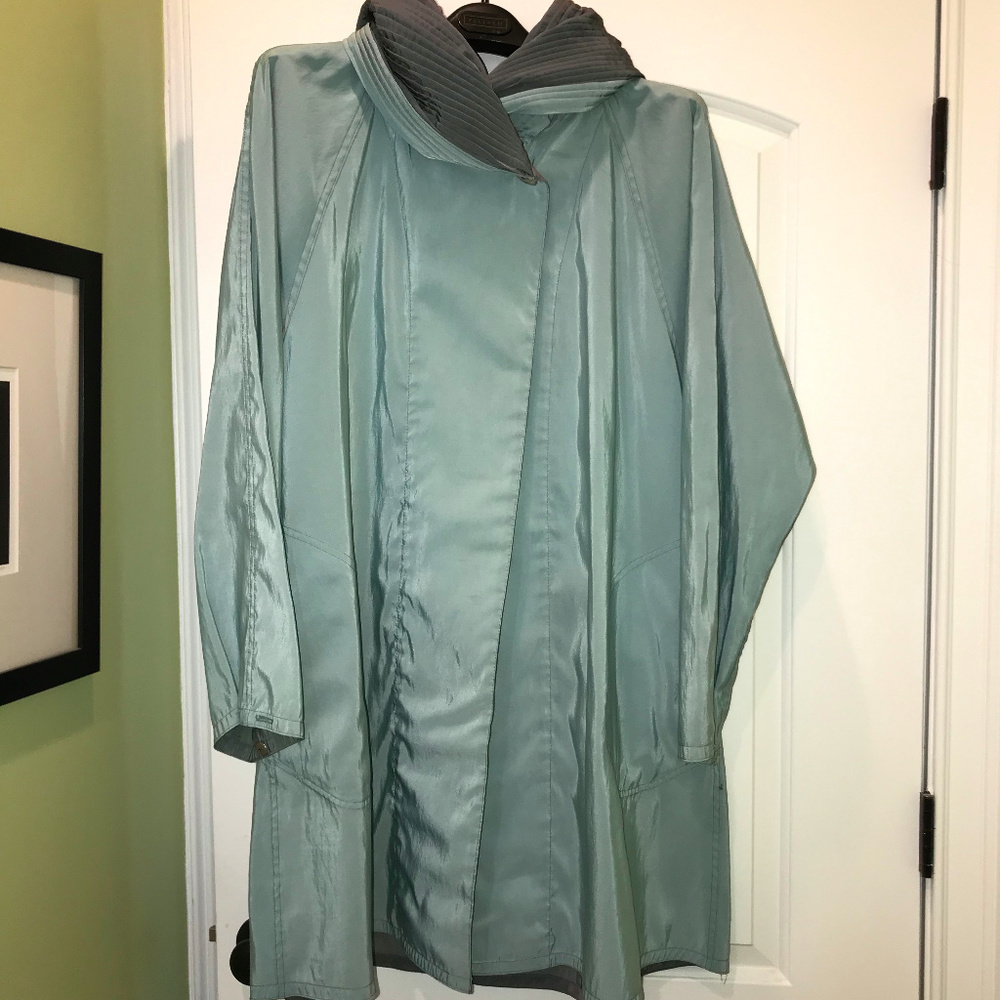 Rain coat, light weight and reversable with hood
